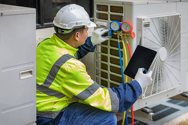 Professional Heat Pump Repair technician working in Lancaster, CA